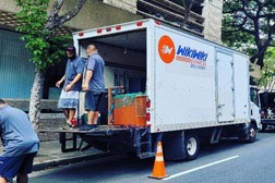 Oahu movers get ready to load furniture for a long distance move.