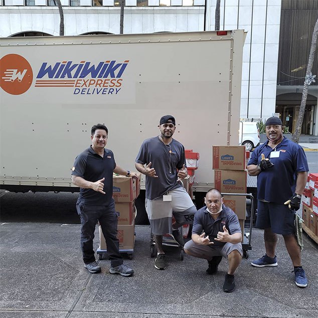 Hawaii movers pose for a company picture. Local delivery services.